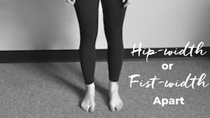 feet hip-width apart and facing forward